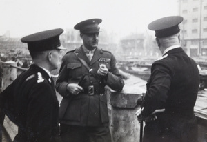 Lieutenant Colonel Charles F. B. Price with police officers, Soochow Creek, Shanghai, October 1937