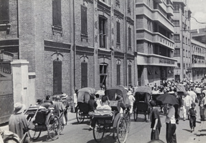 Refugees leaving Zhabei, along North Soochow Road, Shanghai, 1937