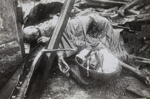 A dead woman, Tungchow Road near Hailar Road, Shanghai, 1937