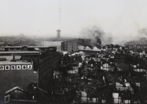 Smoke and fires to the north of Sihang Godown, Shanghai, October 1937