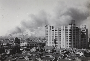 Burning of Zhabei, looking west of Sun Company Department store, Shanghai, October 1937