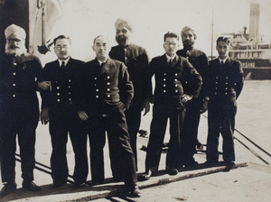 Chinese Maritime Customs Service men by the Huangpu River, Shanghai