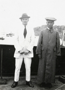 Thomas Johns and another man on board a ship in harbour