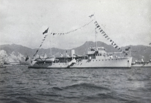 A customs cruiser, with pennants flying