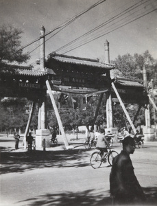 Banner on pailou welcoming allied troops to Peking, 1945
