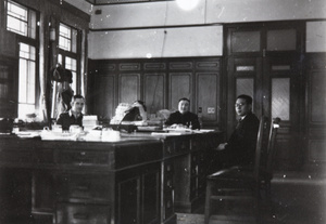 Adrian Evans, Major-General Ho Kan Tzen, and unidentified man, in an office, Peking