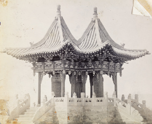 An unidentified pavilion with three tablets