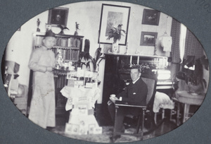 Chinese servant and Leo Dudeney in the Kalee boarding house apartment, Shanghai