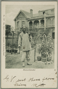 An itinerant flower and plant vendor, in a garden outside houses, Shanghai