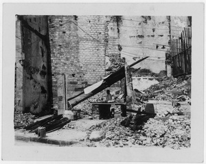A man and a makeshift stall amid rubble, after bombing, Chongqing