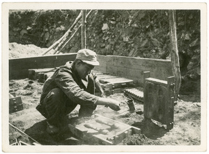 An Eighth Route Army soldier making rudimentary hand grenades, Jinchaji