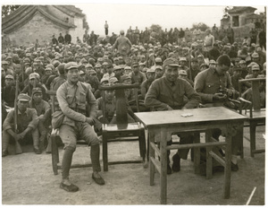 General Zhu De (Chu Teh 朱德) at a meeting to celebrate the fraternization of the Eighth Route Army and Chang Yin-wu's Hopei province People's Army, after Chang Yin-wu's dismissal