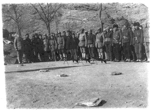 Gathering of militia, with three ZB-26 light machine guns on the ground in front of them, Jinchaji
