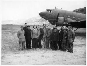 A group of Chinese and foreigners next to a Douglas C-47 Skytrain (Dakota), Yan'an (延安)