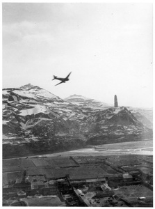 A Douglas C-47 Skytrain circling to land at the airfield at Yan'an (延安), 1944