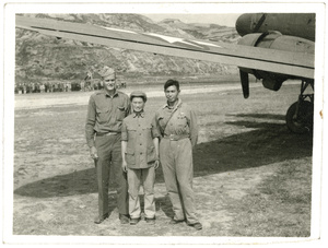 Major Dole, Hsiao Li Lindsay (李效黎) and Li Xue ('Mike' Alley, an adopted son of Rewi Alley), beside a Douglas C-47 Skytrain, Yan'an (延安)