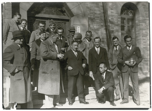 Group of unidentified foreign and Chinese men, three with cameras
