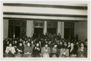Students having a meal in a hall