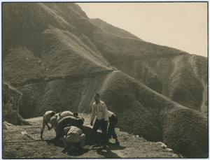 Workers making a new mountainside road, Henan
