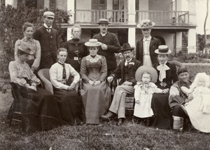 Group of missionaries with an amah and children
