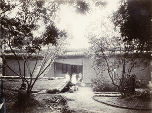 Legation Chancery, British Legation, Peking, with bomb shelter in garden