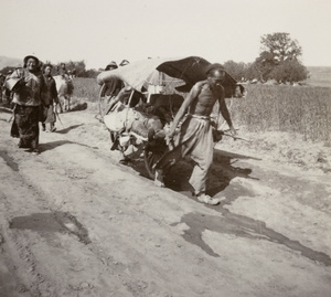 British official on a wheelbarrow, Shandong