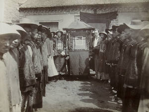Officials with portrait of King Edward VII, before the procession through Qufu