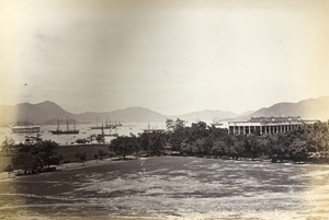 View of ships in the harbour and Murray House, Hong Kong