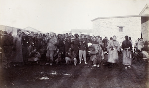 Chinese labourers having their lunch, Hong Kong