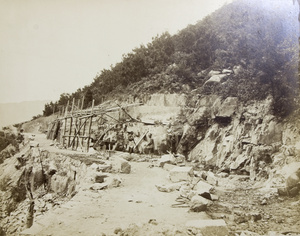 A roadside construction by a rocky hillside, Hong Kong
