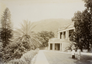 Chinese couple in front of Government House, Hong Kong