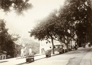 Line of sedan chairs on the side of the road next to the Peak tramway, Hong Kong