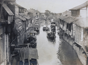 Canal flanked by houses