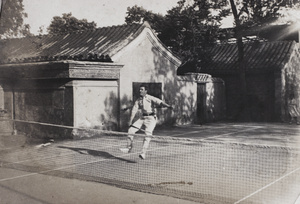 Oliver Hulme playing tennis