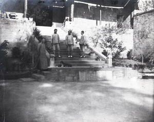 Chinese men and servants on steps of tennis pavilion, Anqing (安庆）