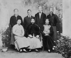 Studio portrait of Chinese men and Westerners