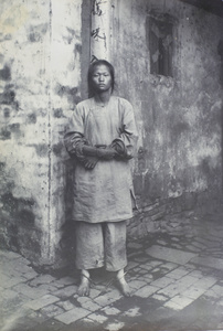 A man in manacles (an alleged perpetrator of the ‘Kucheng massacre’), Gutian