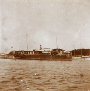 A steamer moored at a harbour