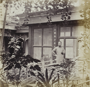 Yang Fang in the smaller courtyard of his house, Beijing