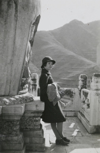 Margaret Lampson by a marble stupa, Temple of the Azure Clouds, Western Hills, Beijing