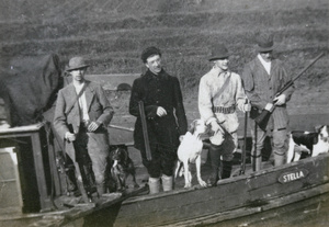 Duck hunters, with their dogs, on the 'Stella'