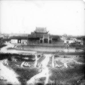 A temple, pailou, pond and city walls
