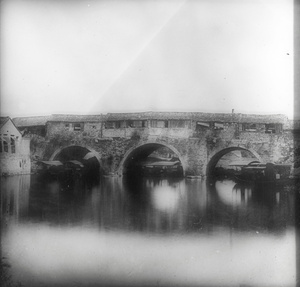 A covered stone bridge with three arches, Nanjing