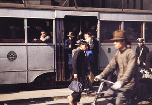 Passengers and tram, Shanghai, 1945