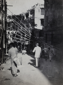 Bamboo buttresses in Wyndham Street, Hong Kong, and Dairy Farm Company Depôt