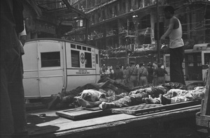 Ambulances and corpses, Nanking Road, Shanghai, 23 August 1937