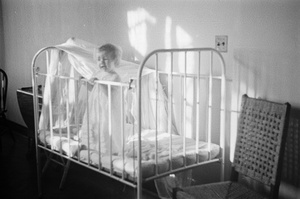 Child in a crib, Shanghai