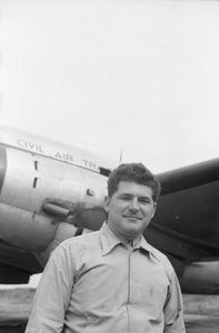Crew man, with Civil Air Transport airplane