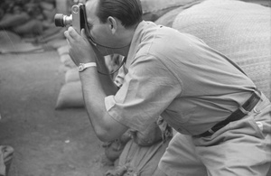 Photojournalist Harrison Forman taking a picture, Shanghai