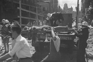 Removing corpses after bombing, Nanking Road, Shanghai, 23 August 1937